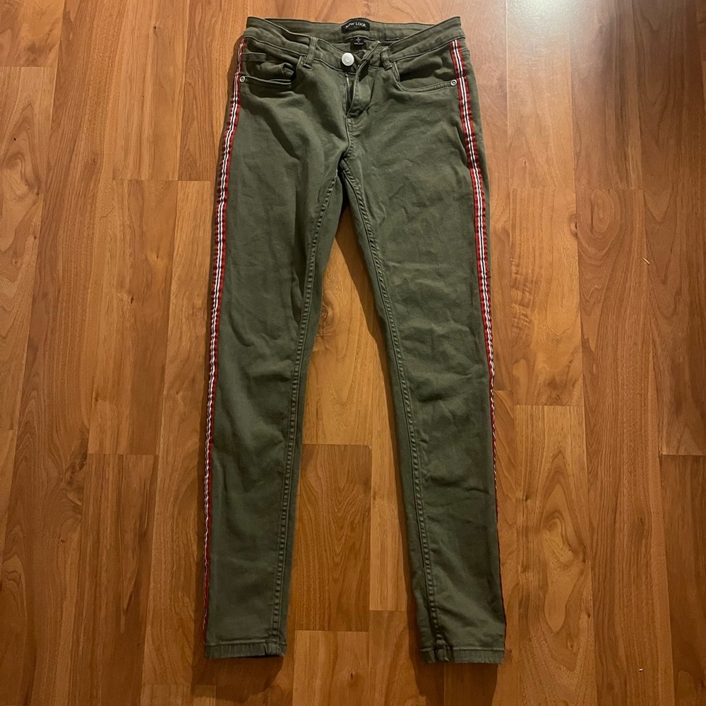 2016 Olive Green jeans, red, black and white stripe going down both sides